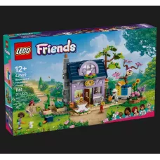 Конструктор LEGO Friends Будиночок і квітник бджолярів (42669)